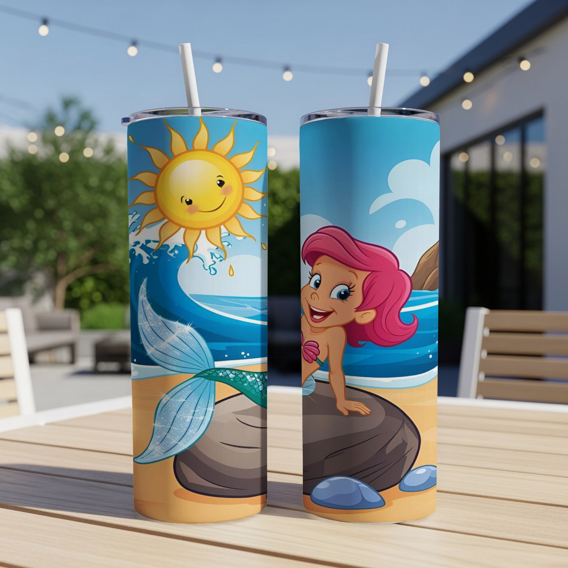 Mermaid, sun, and ocean wave illustration on two travel tumblers.