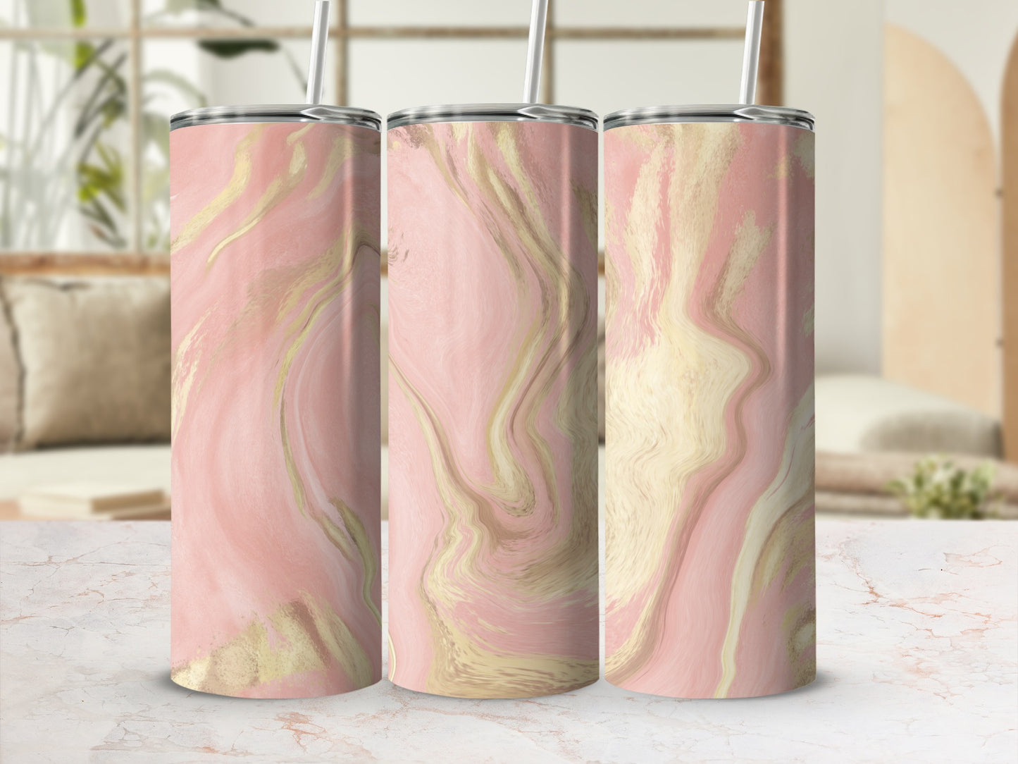 Pink and gold marble pattern tumbler with straw, shown in three angles.
