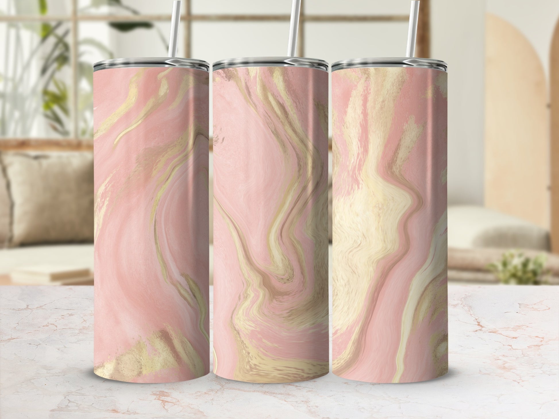 Pink and gold marble pattern tumbler with straw, shown in three angles.