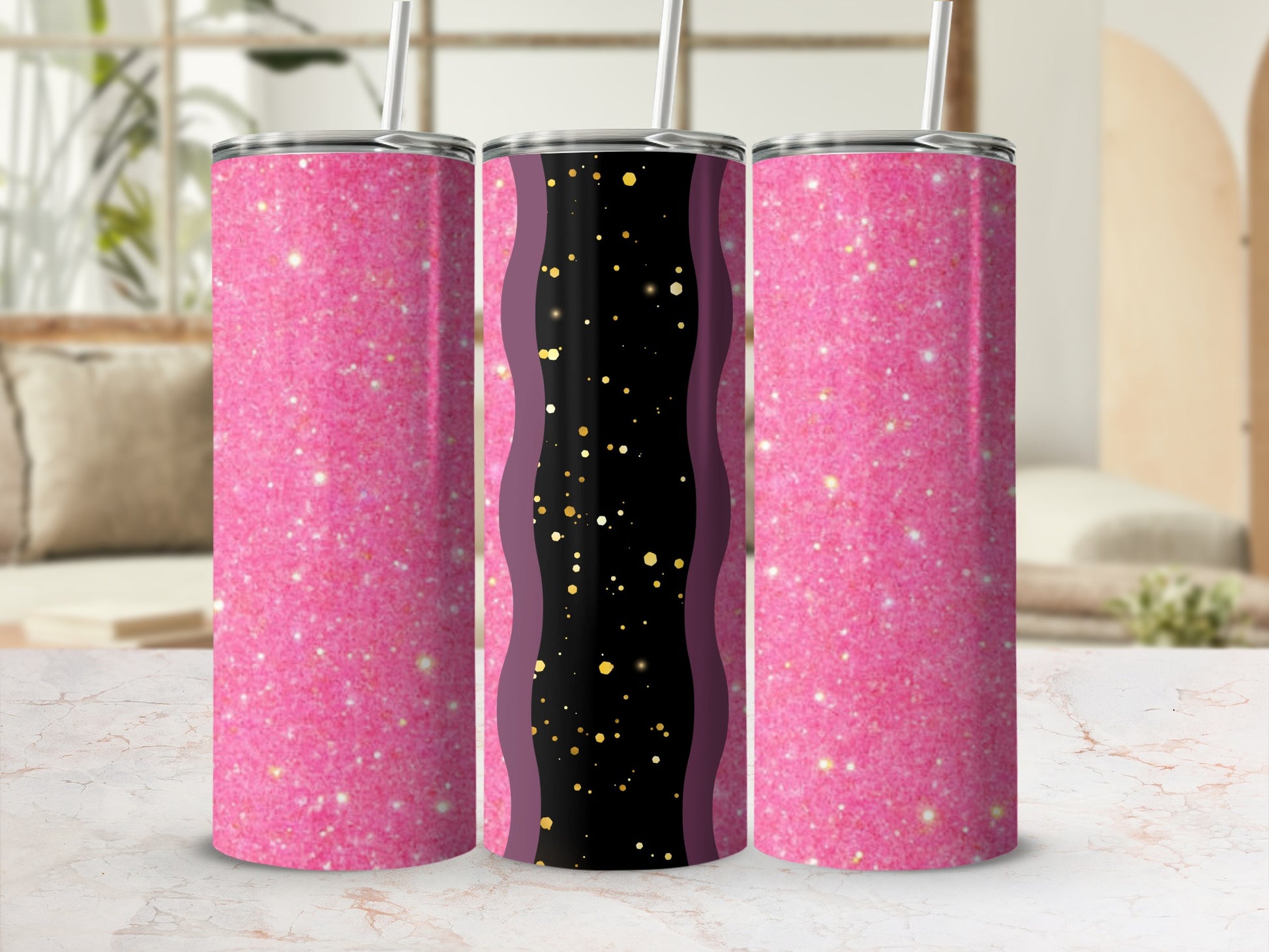 Pink glitter tumbler with black and gold wavy pattern and straw.