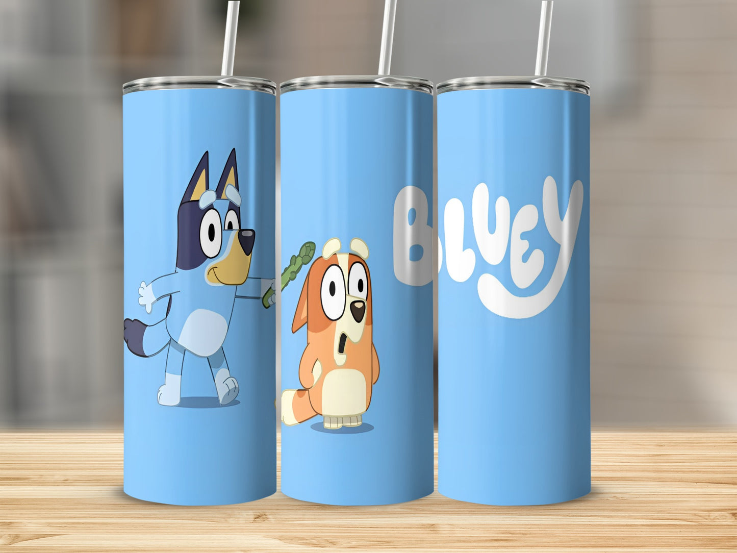 Bluey and Bingo characters on light blue tumblers with "Bluey" text.