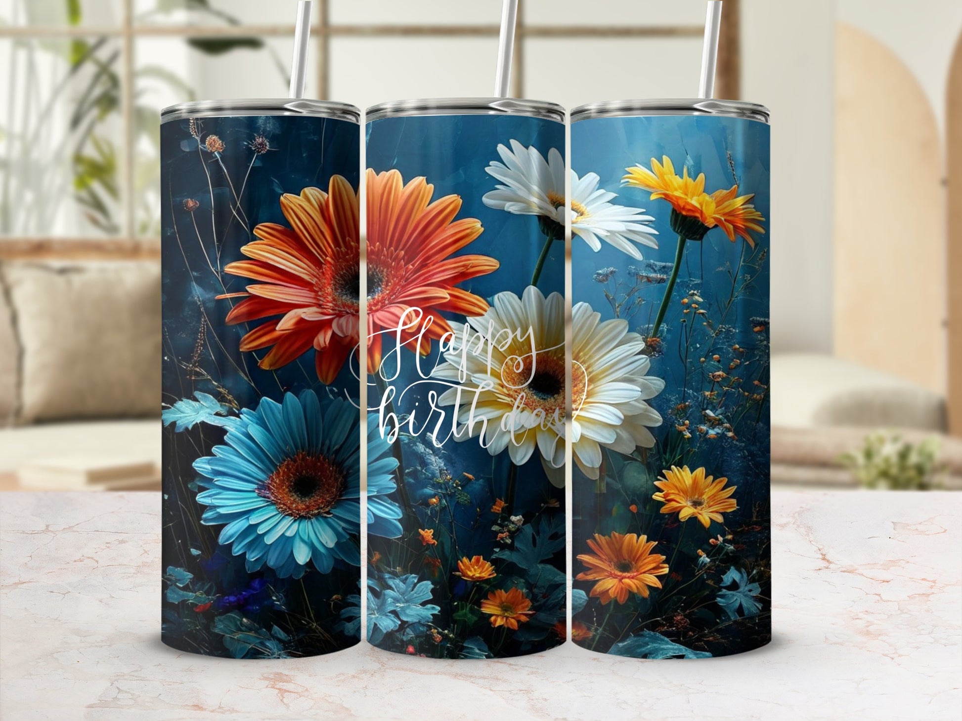 Blue tumbler with orange and white gerbera daisies and "Happy Birthday" text.