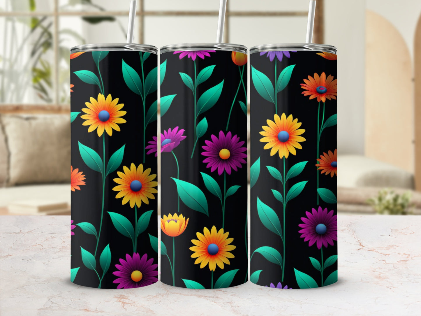 Three tumblers with colorful floral patterns on a dark background.
