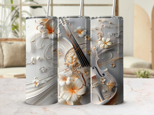 White tumbler with embossed floral and violin design.