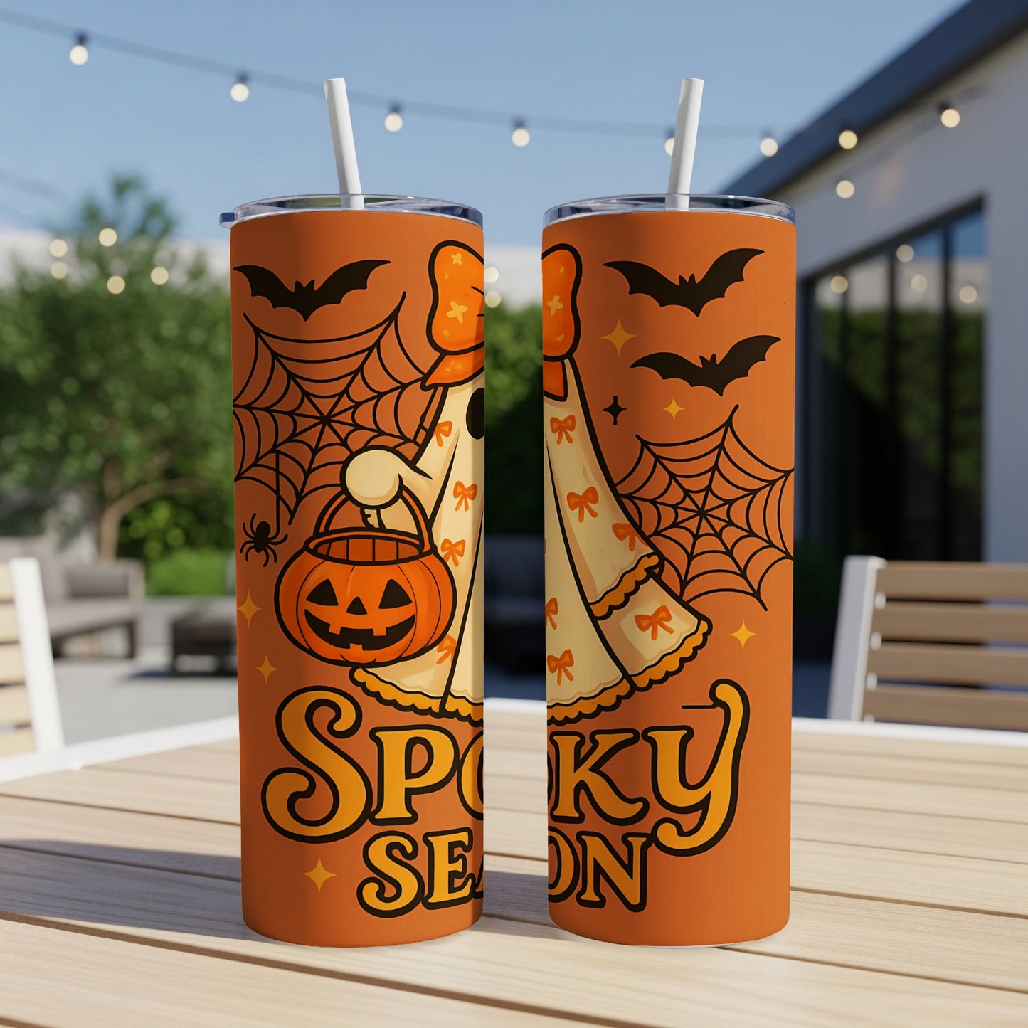 Orange tumblers with Halloween ghost design and "Spooky Season" text.
