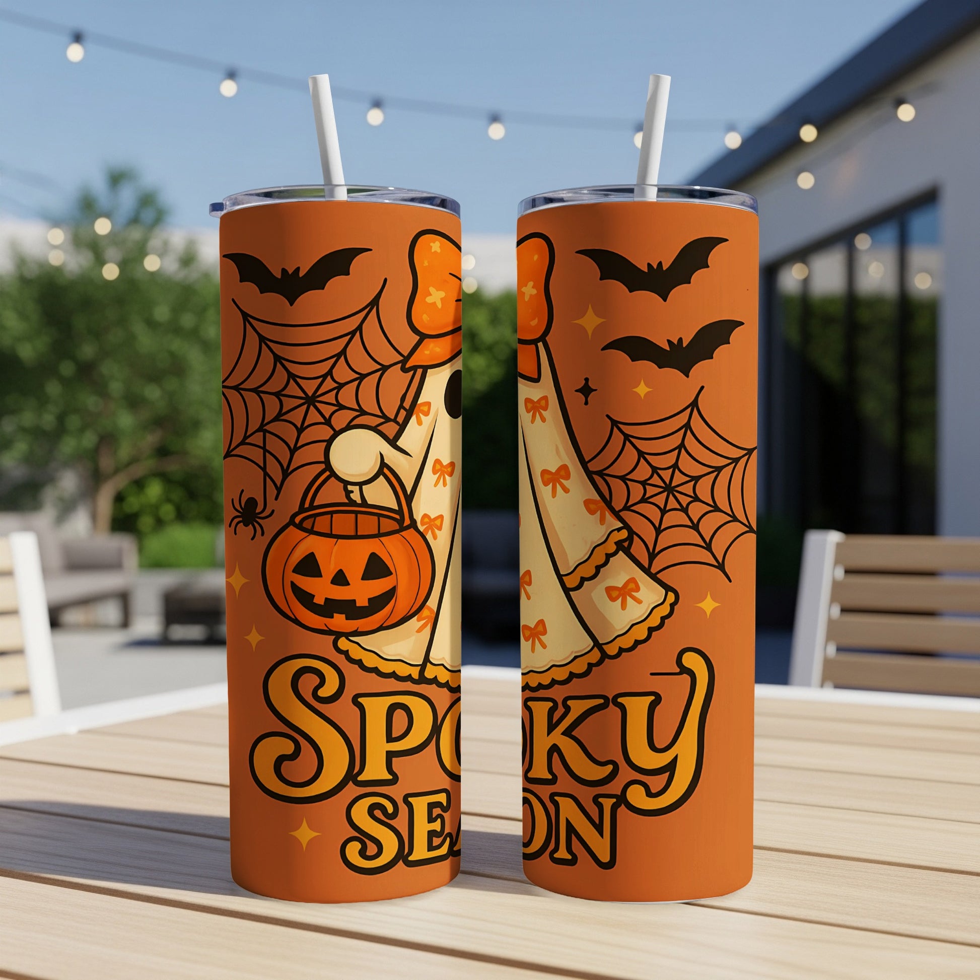 Orange tumblers with Halloween ghost design and "Spooky Season" text.