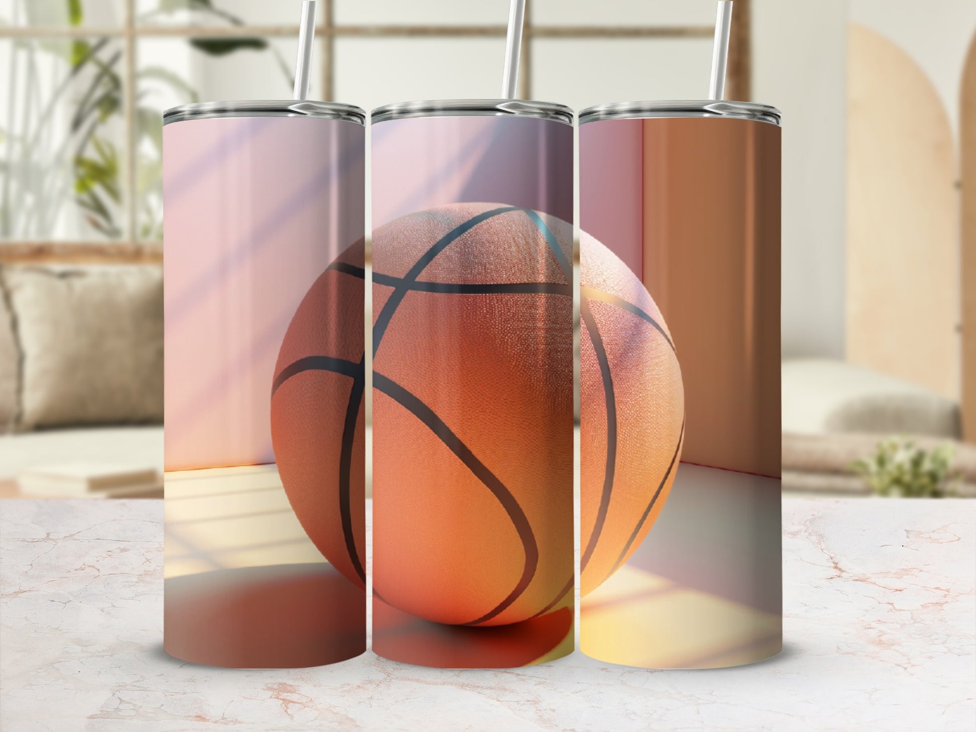Three tumblers with basketball graphics, showcasing different angles and warm lighting.