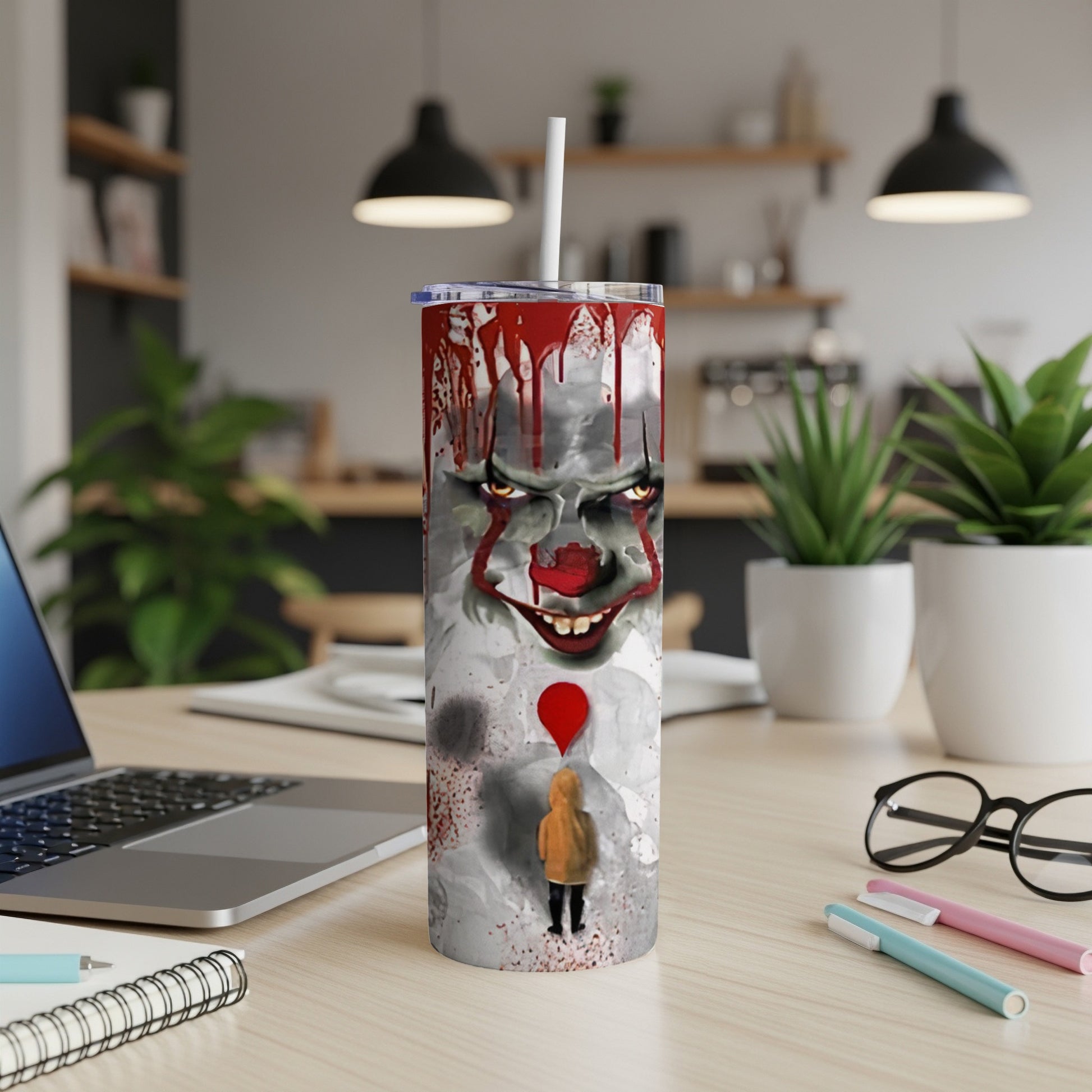 Tumbler featuring a creepy clown face with bloody drips and a child with a red balloon.