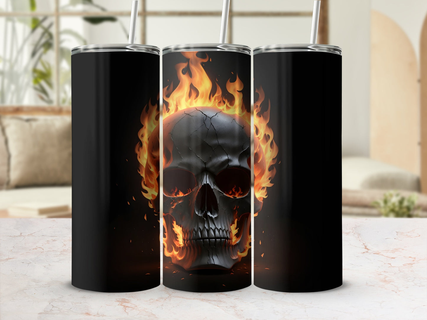 Black tumbler with flaming skull graphic centered on a white marble surface.