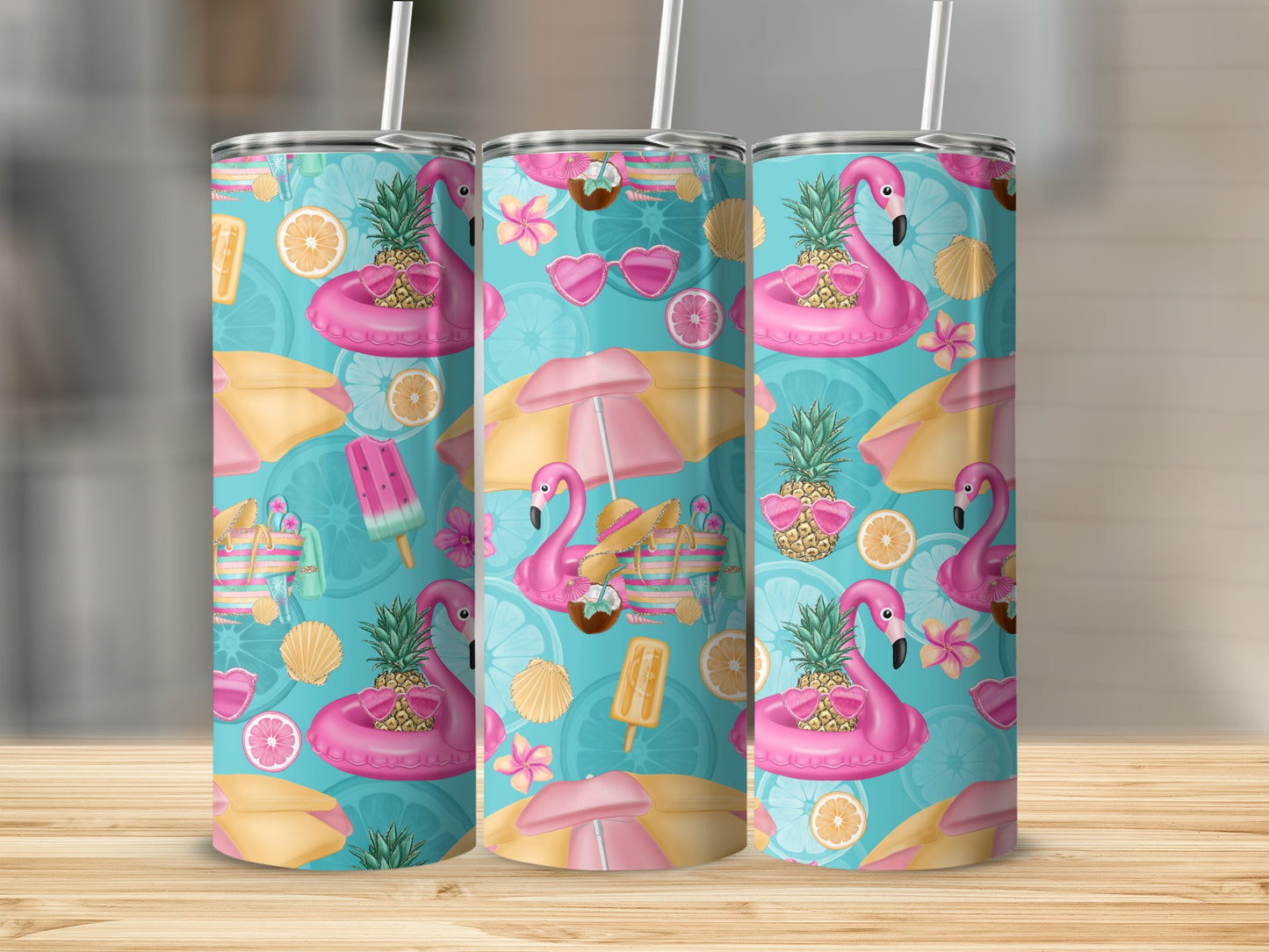 Three tumblers with a tropical flamingo and pineapple summer pattern.