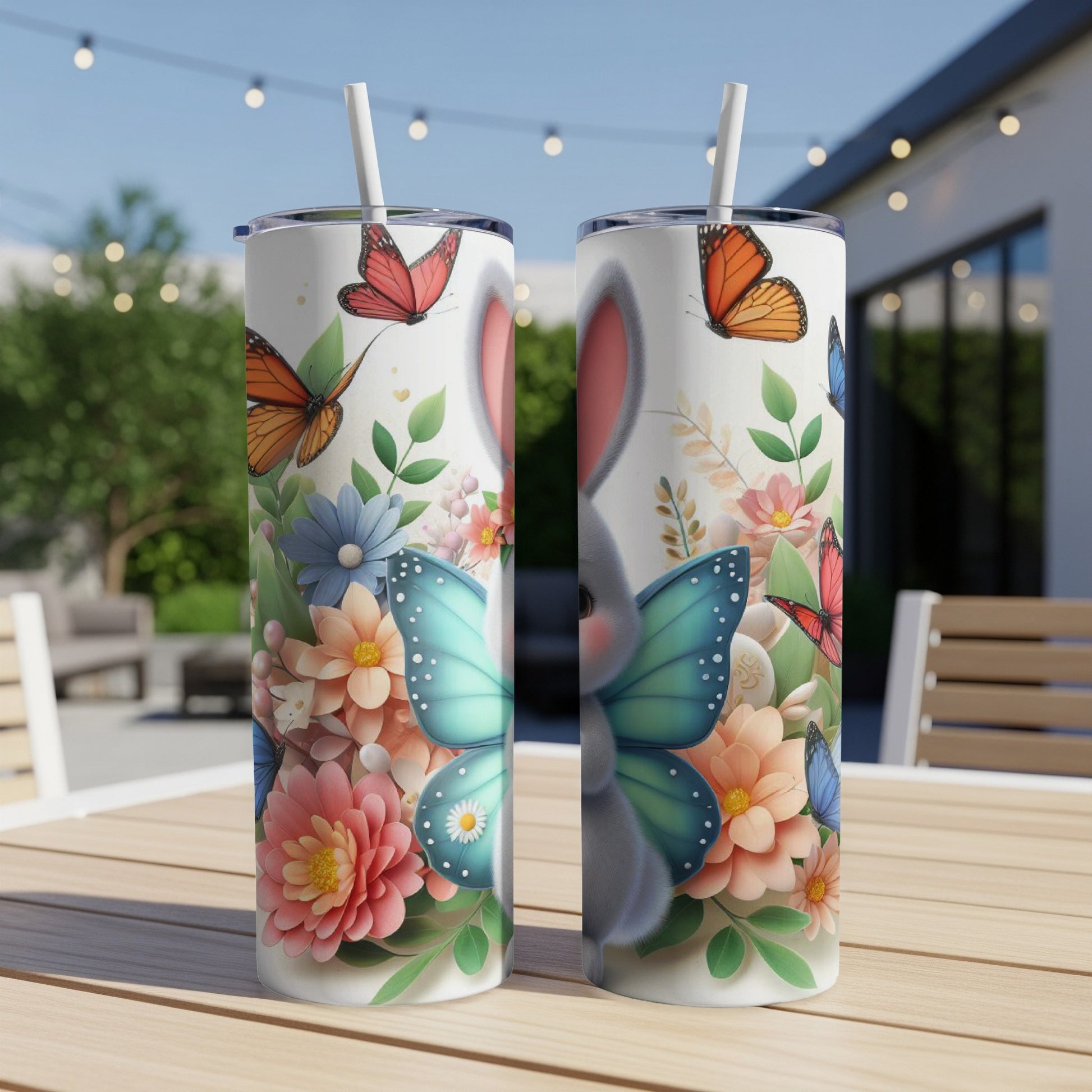 Easter bunny and butterflies on a floral patterned tumbler cup.