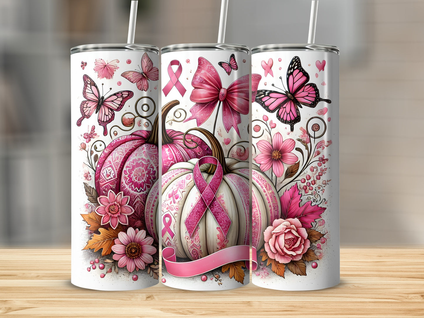 Three pink pumpkins with breast cancer ribbons, butterflies, and flowers.