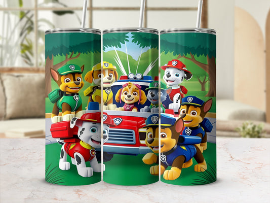 Paw Patrol characters on a fire truck in a park.