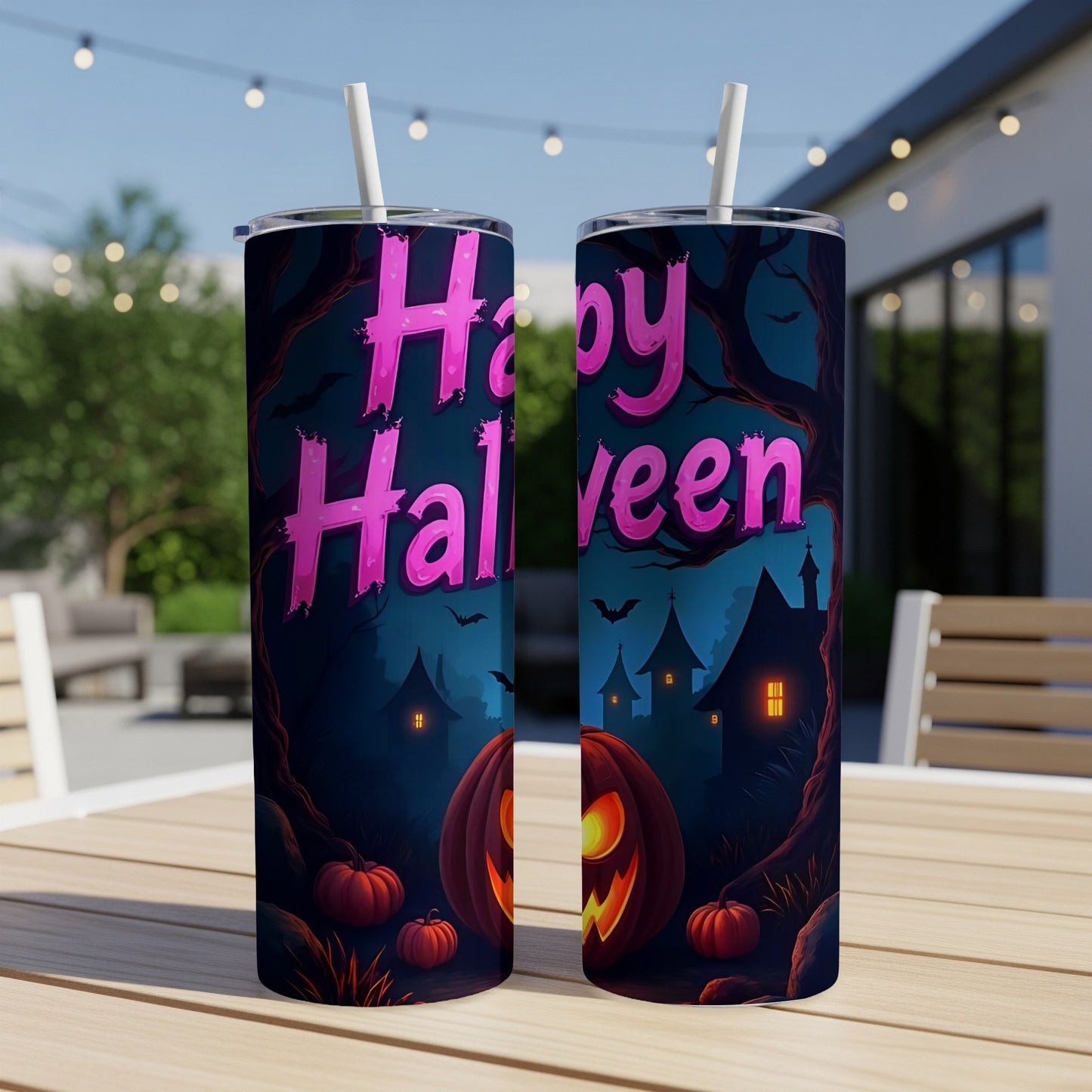 Two tumblers with a spooky Halloween design featuring pumpkins, haunted houses, and bats.
