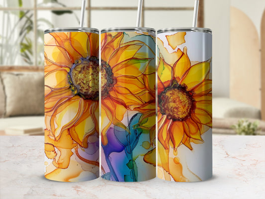 Three tumblers with abstract sunflower and ink splash designs.