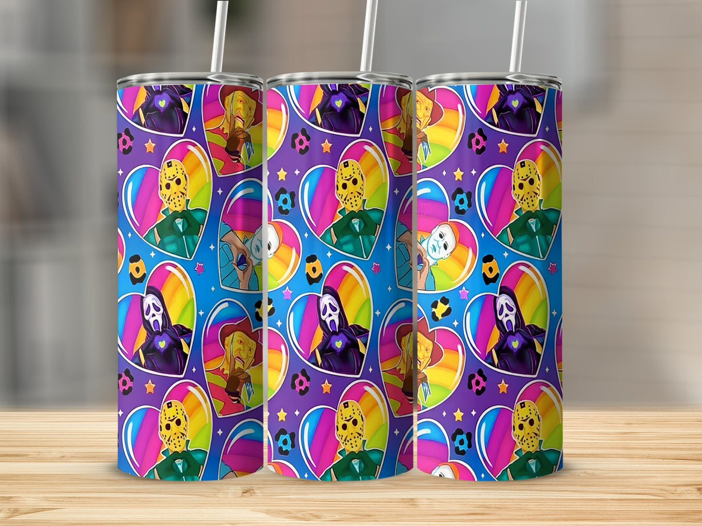 Tumbler with a repeating pattern of horror movie villains inside rainbow hearts.