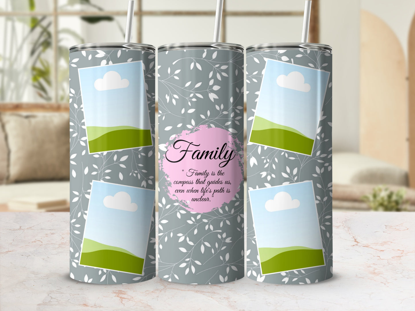 Gray tumbler with leaf pattern, photo frames, and "Family" quote.