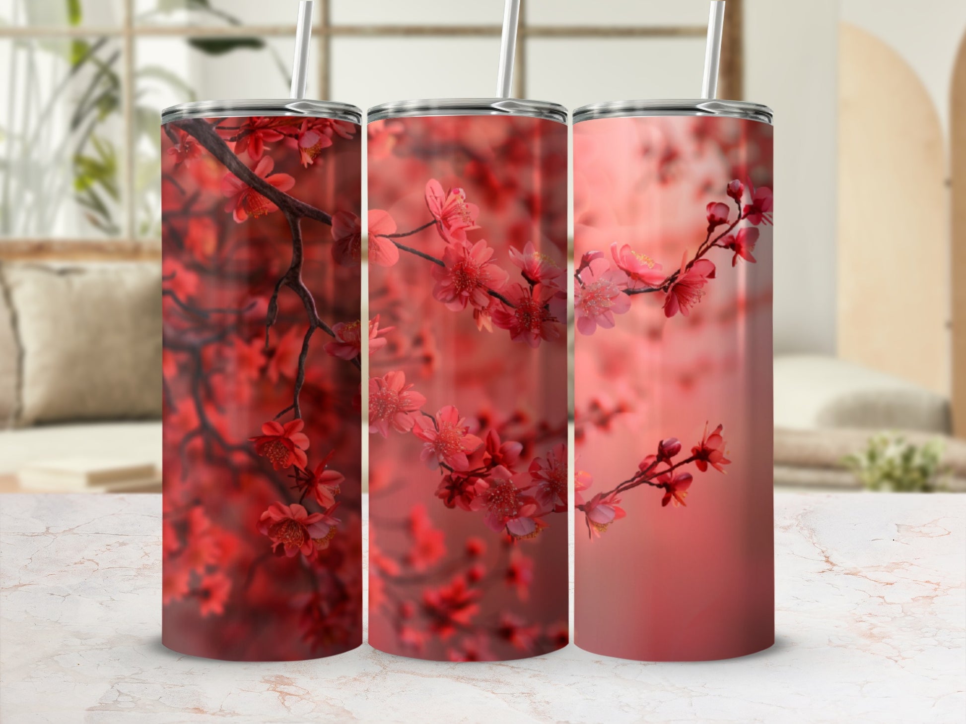 Three tumblers with a close-up of red cherry blossoms.