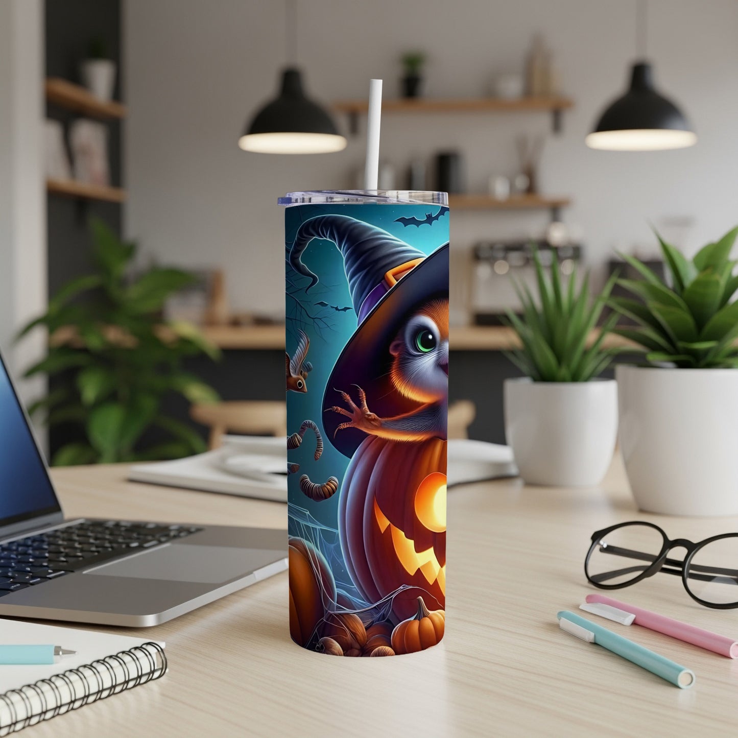 Halloween tumbler featuring a squirrel in a witch hat beside a jack-o'-lantern.