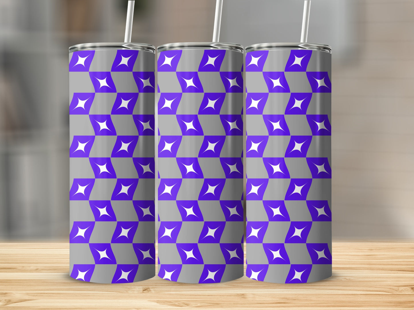 Three tall tumblers with a purple and grey geometric pattern.