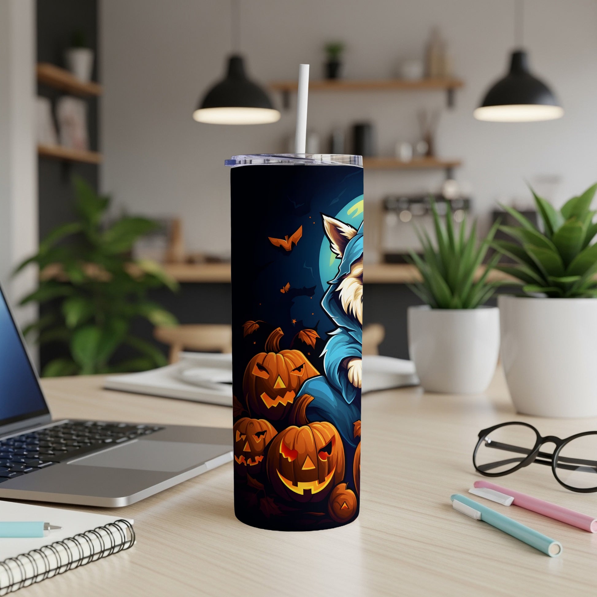 Halloween tumbler with a cat in a blue robe surrounded by jack-o'-lanterns and bats.