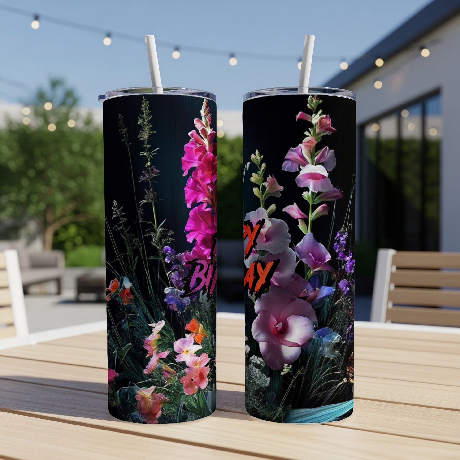 Tall tumbler with "Happy Birthday" text surrounded by vibrant flowers.