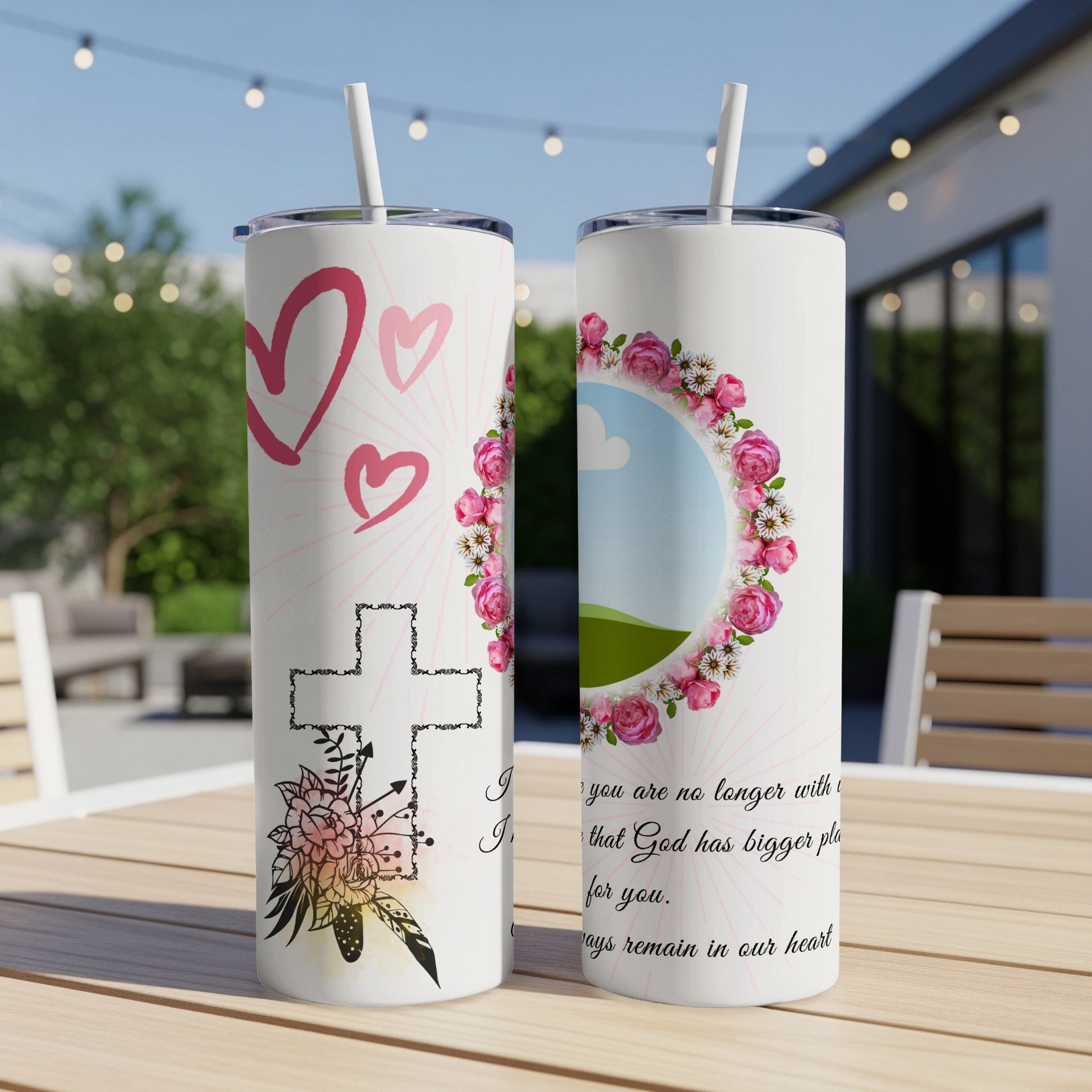 White tumblers with floral cross, hearts, and "God has bigger plans" quote.