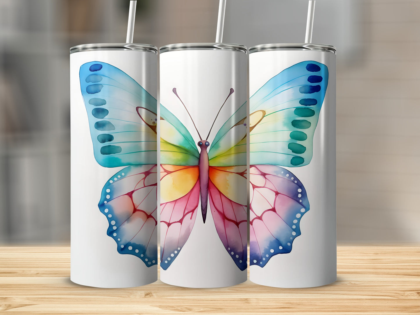 White tumblers with a colorful watercolor butterfly design.