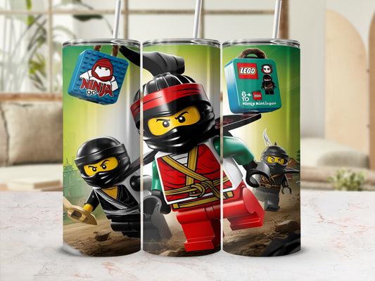 Three Lego Ninja tumblers with straw, featuring characters and Lego brick packaging.