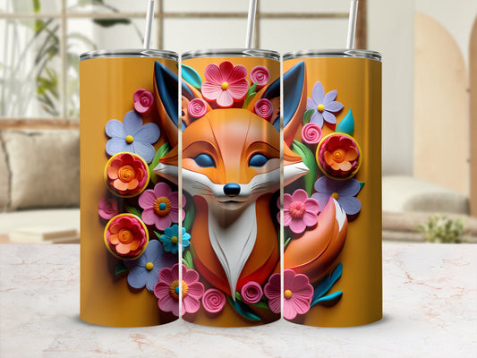Orange tumbler with a stylized fox surrounded by colorful flowers.