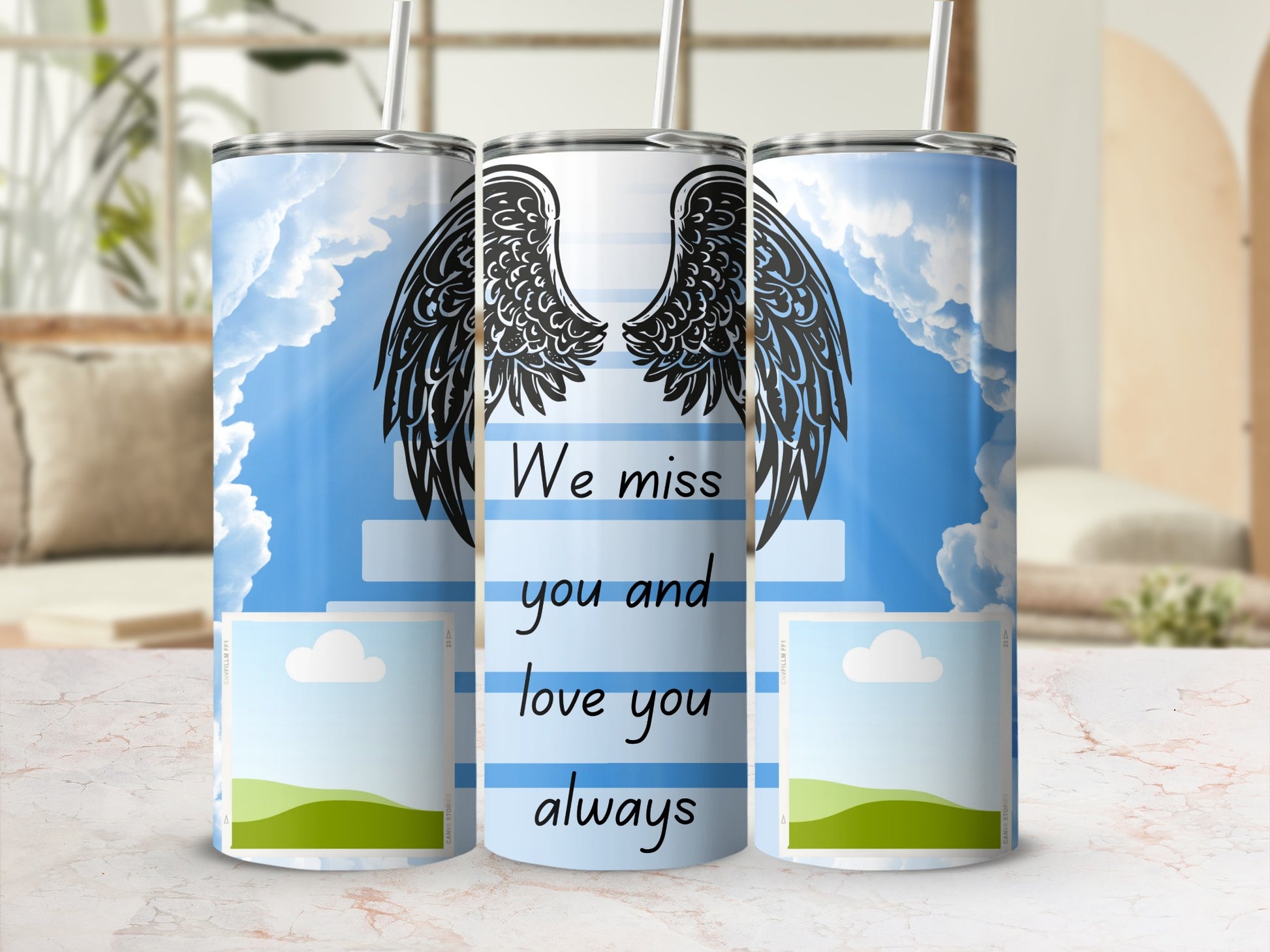 Tumbler with angel wings and text "We miss you and love you always".