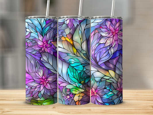Three tumblers with stained-glass floral patterns in shades of purple, blue, and green.