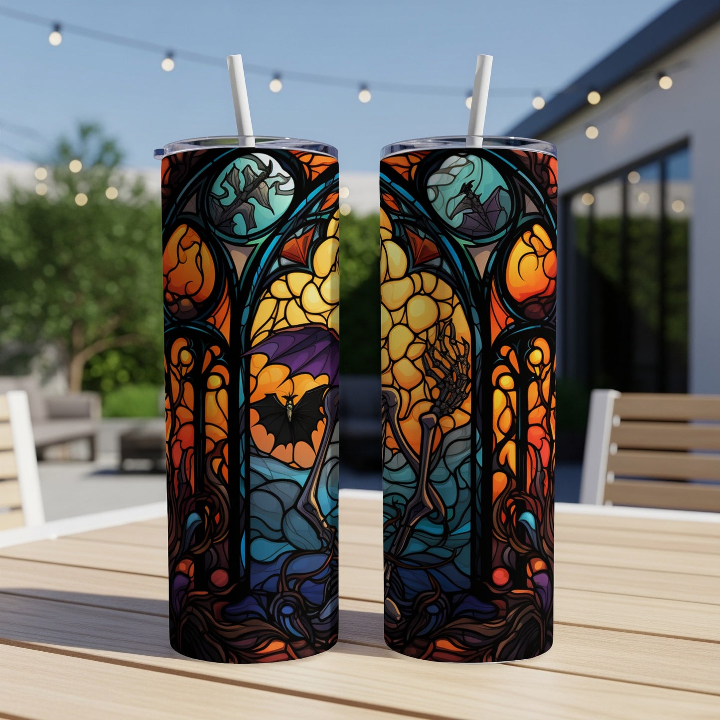 Halloween stained glass design tumbler with bat and skeleton.