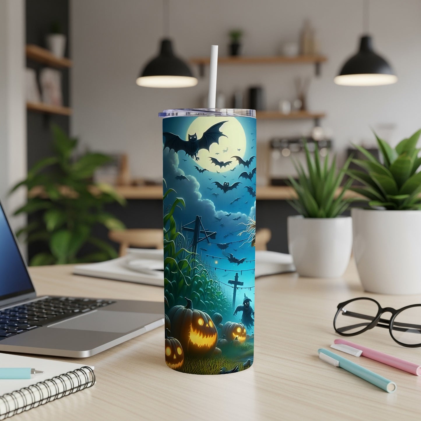 Tall tumbler with Halloween scene featuring bats, pumpkins, corn, and a scarecrow under the moon.