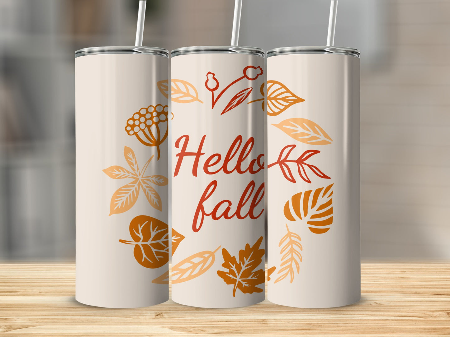 Three fall-themed tumblers with a leaf wreath and "Hello fall" text.