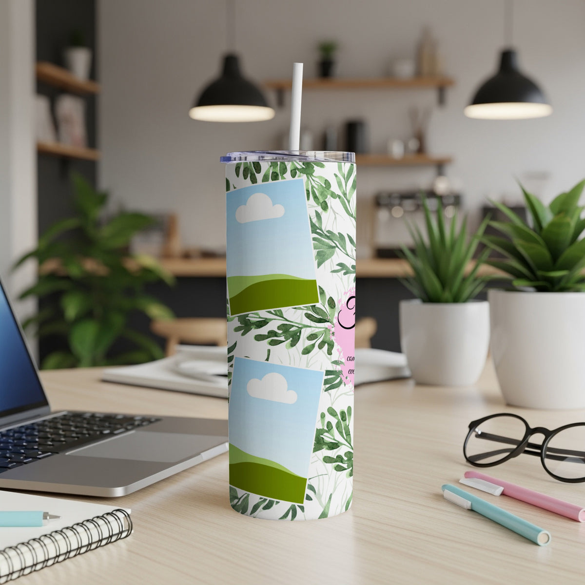 Tumbler with custom photo inserts and green leaf pattern.