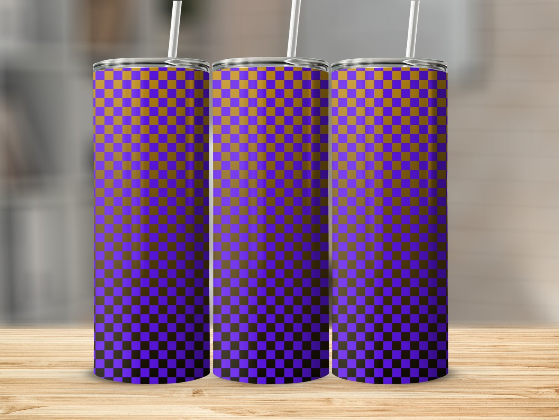 Three tall tumblers with a purple and gold checkerboard pattern.
