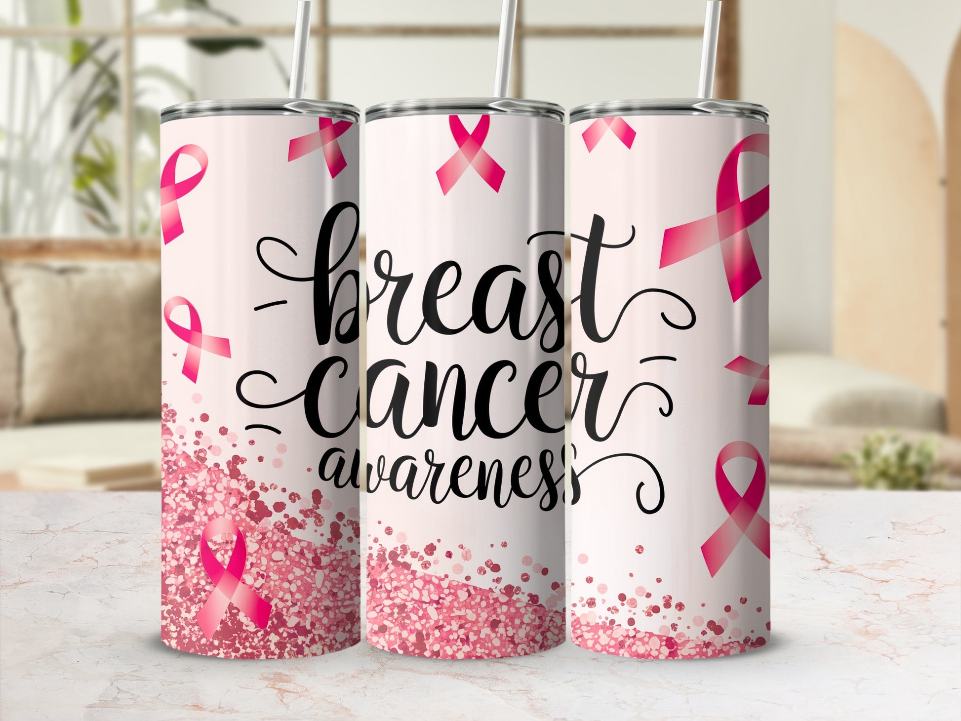 Pink glitter and breast cancer awareness ribbon tumbler with straw.