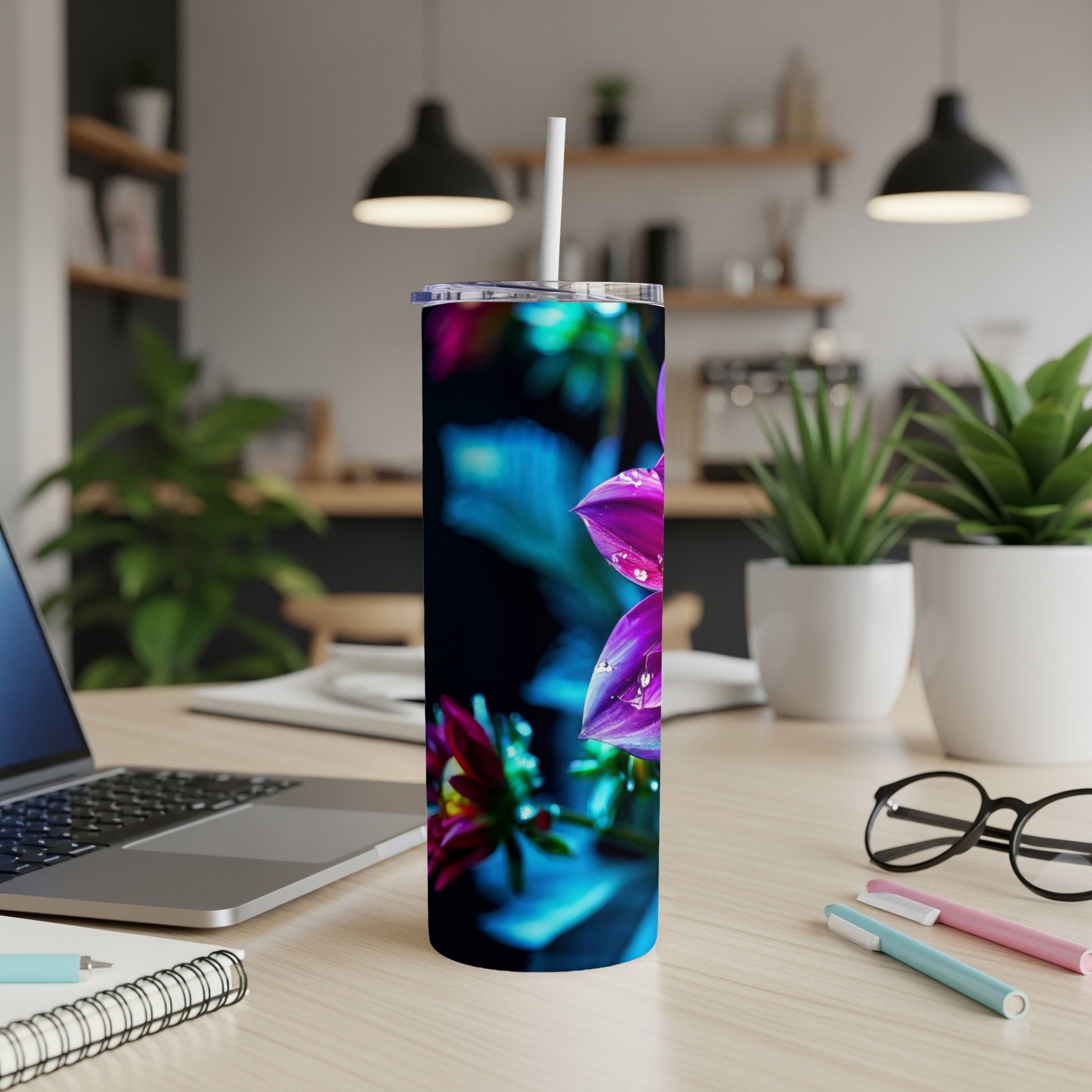 Tall skinny tumbler with purple flowers and water droplets.