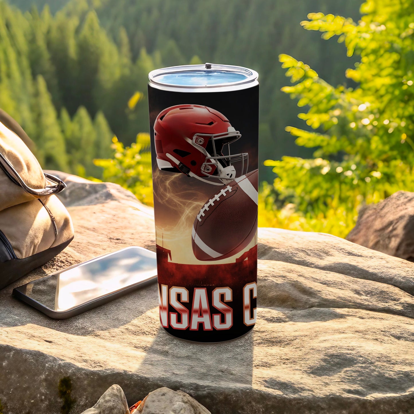 Red football helmet and ball on a tumbler with "Kansas City Chiefs" text.
