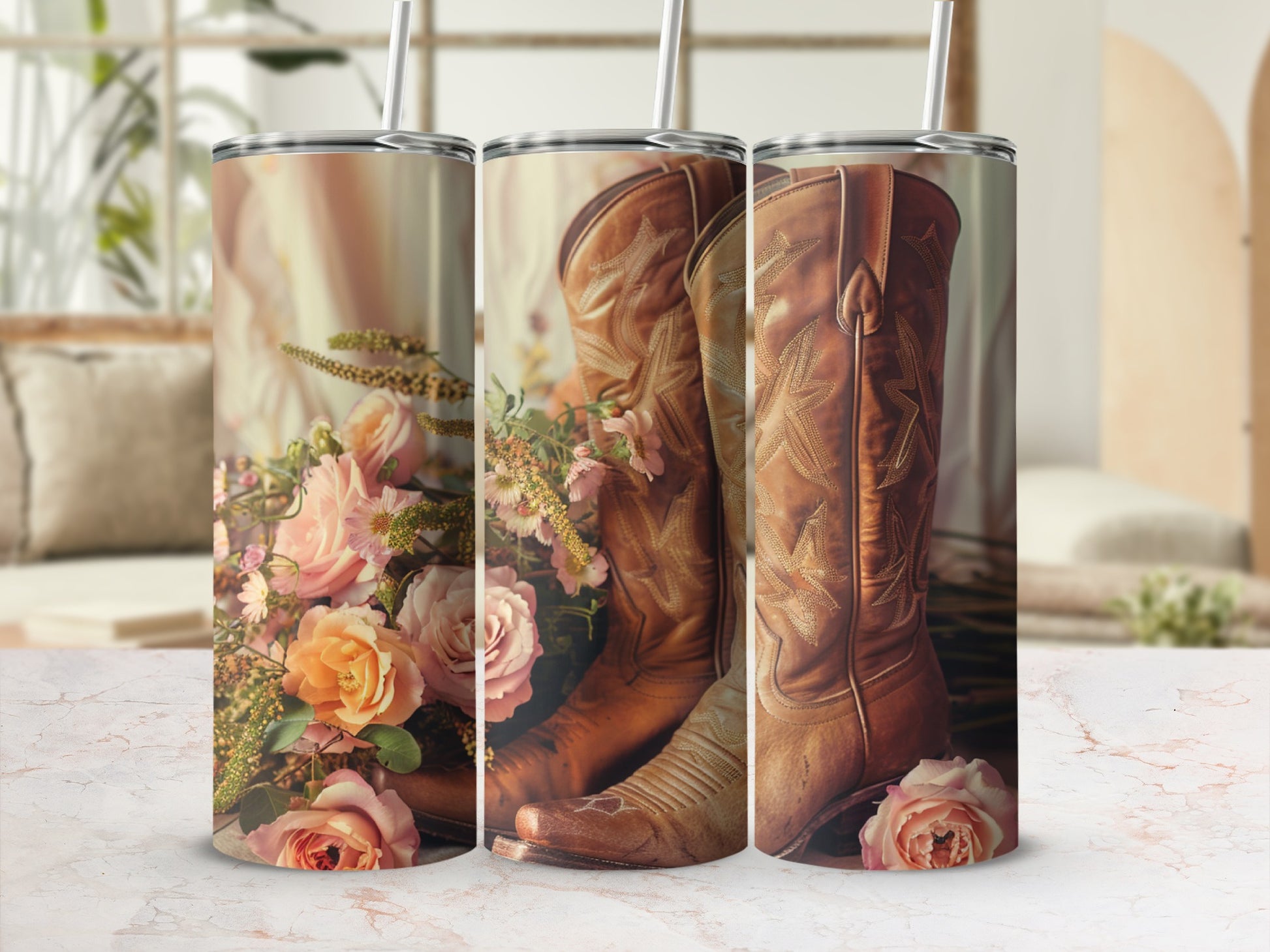Cowboy boots with flowers, displayed on a marble surface.