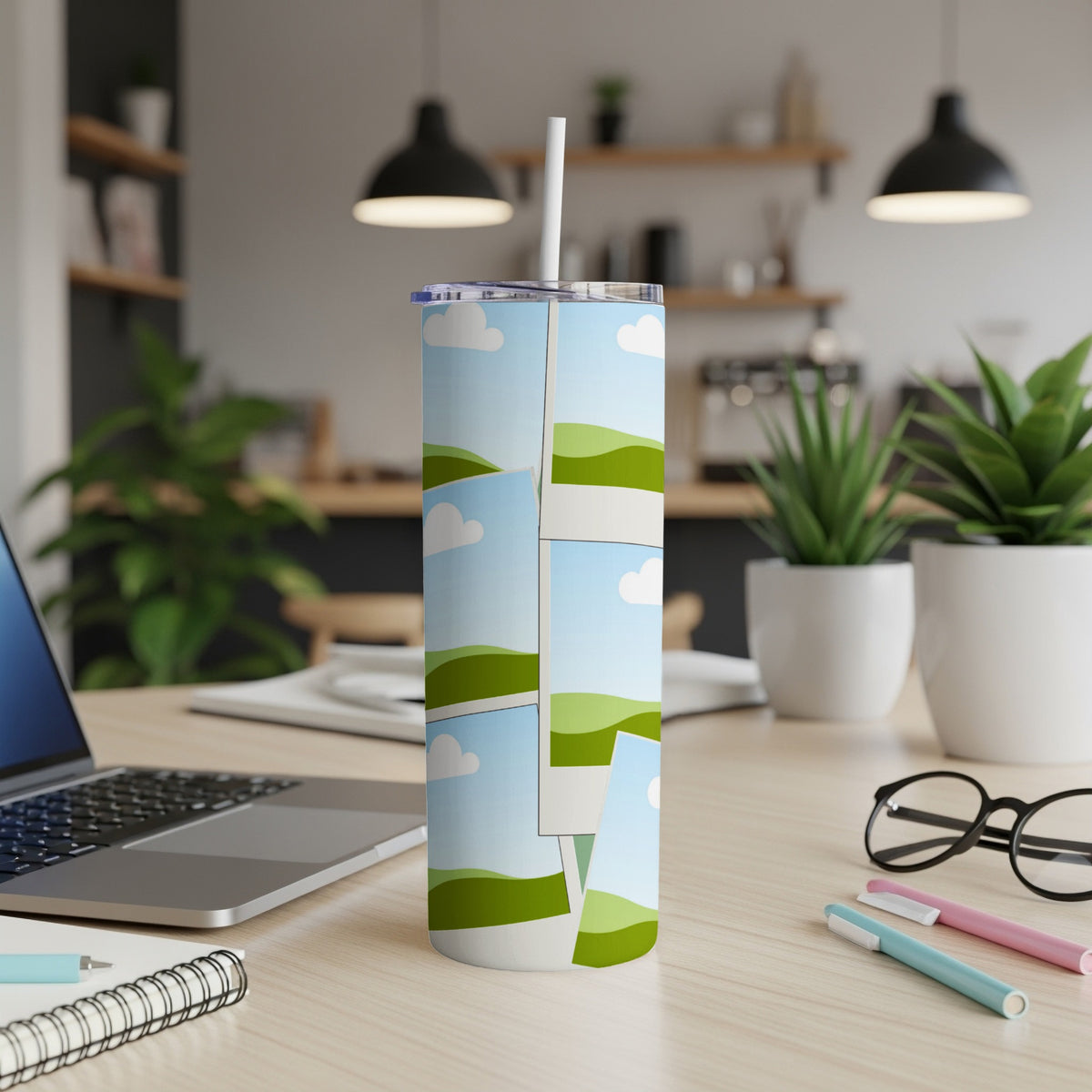 Tall tumbler with a collage of landscape photos of rolling green hills and blue sky.