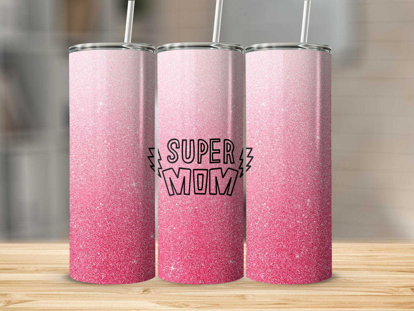 Pink glitter tumbler with "Super Mom" text in black lettering.