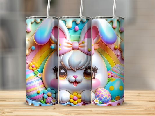 Easter bunny with rainbow, colorful eggs, and flowers on a tumbler.