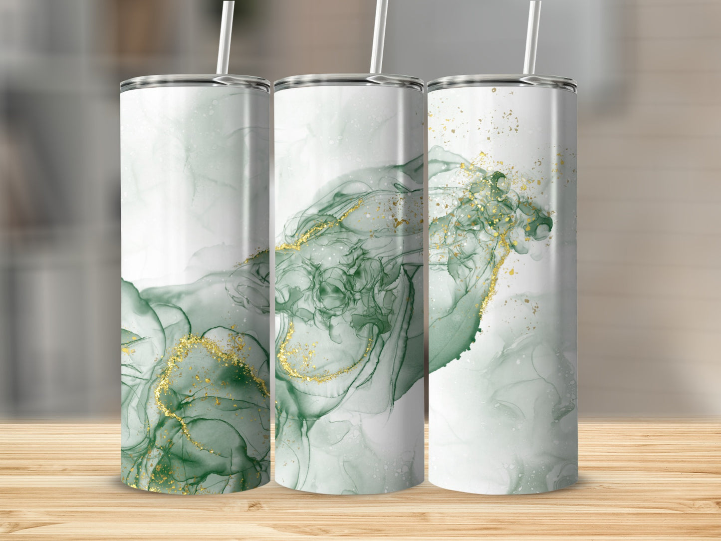 Three tumblers with swirling green and gold abstract watercolor design.