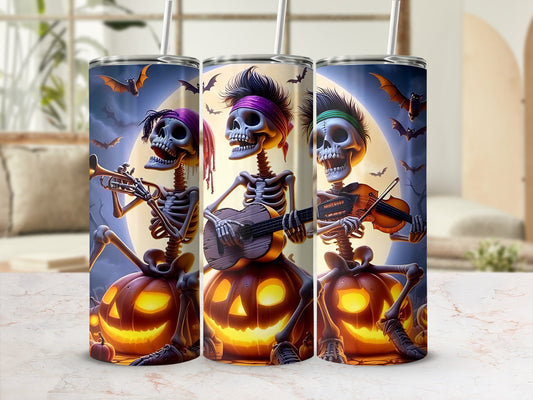 Three skeletons playing instruments on pumpkins with bats in the sky.