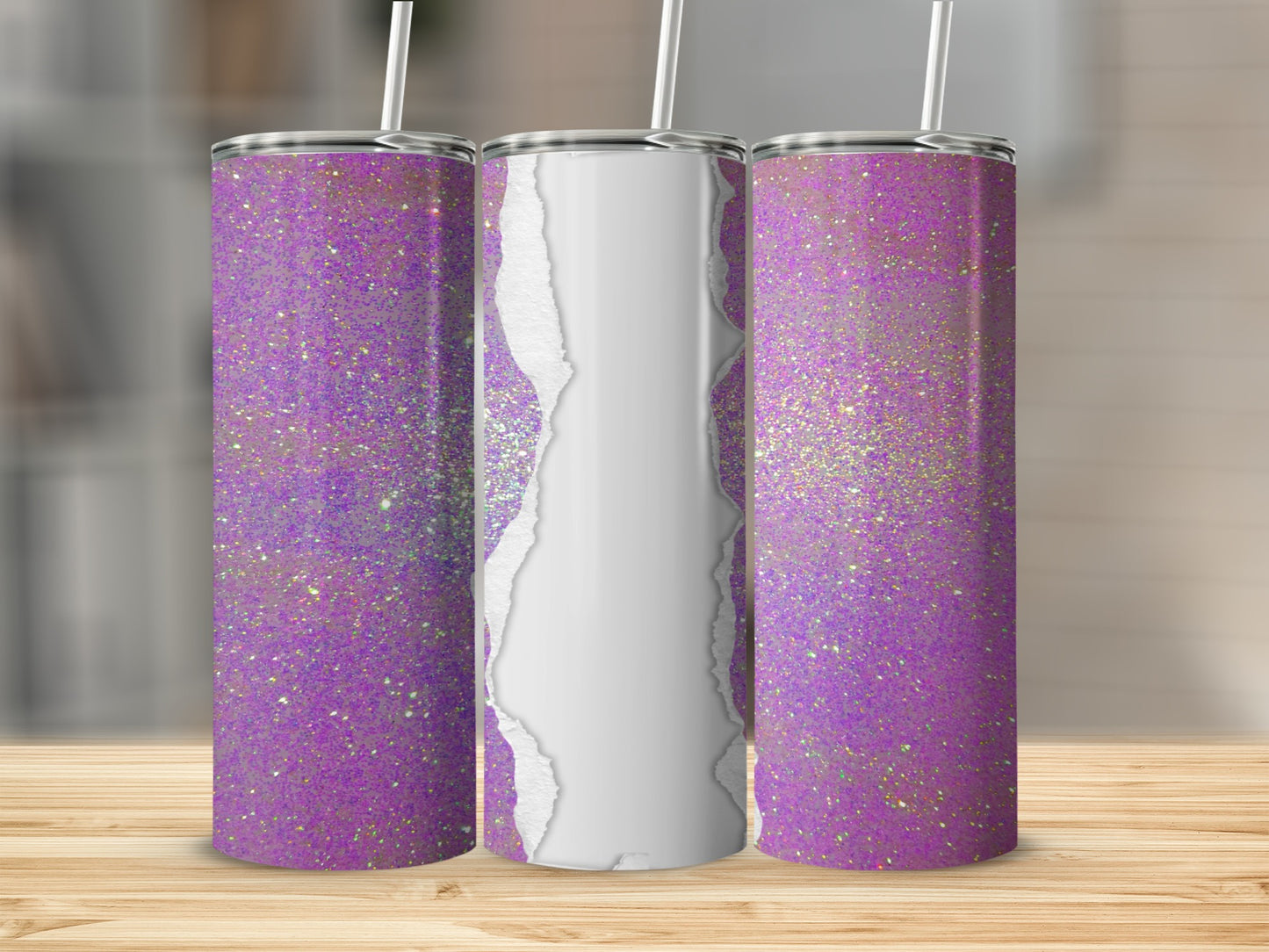 Three purple glitter tumblers with white ripped paper overlay on a wooden surface.