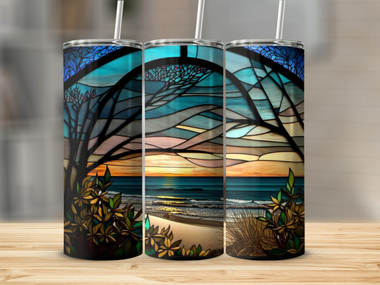 Three tumblers with stained glass design of a beach sunset with trees.