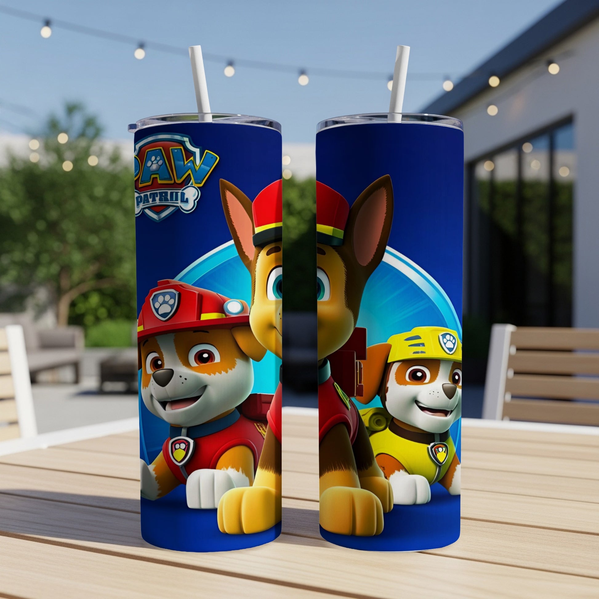 Paw Patrol's Chase and Marshall on a blue background with a straw.
