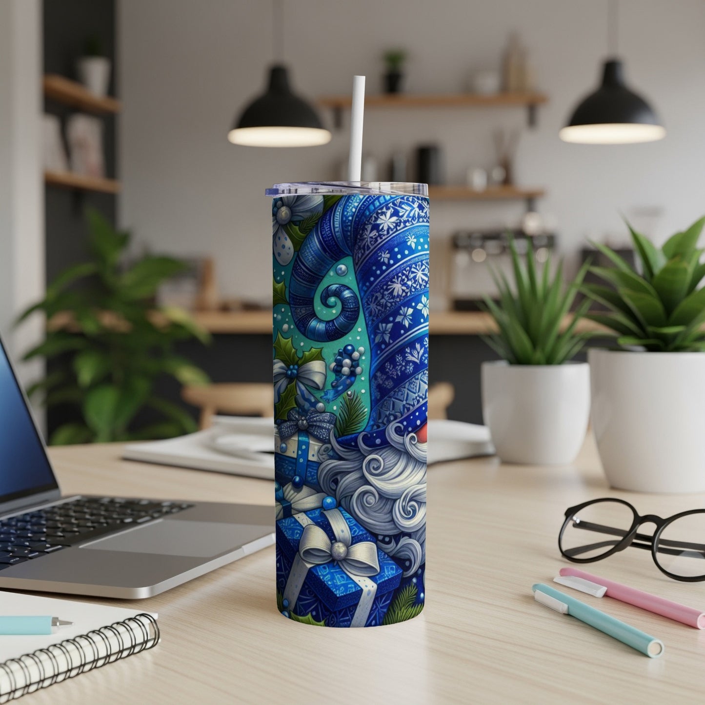 Blue Santa Claus tumbler with gifts, snowflakes, and winter patterns.